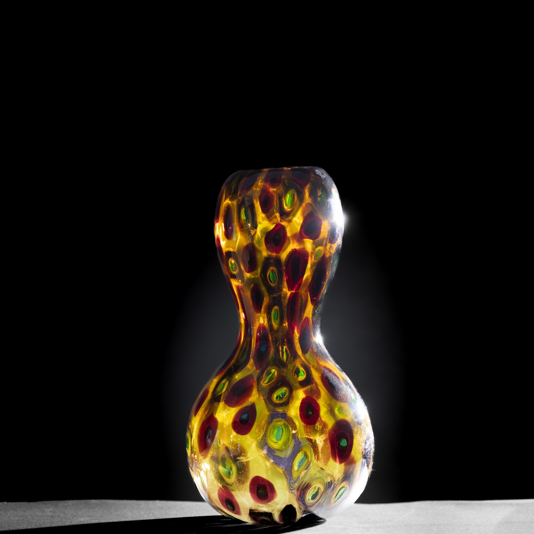 Colorful glass sculpture on a black background