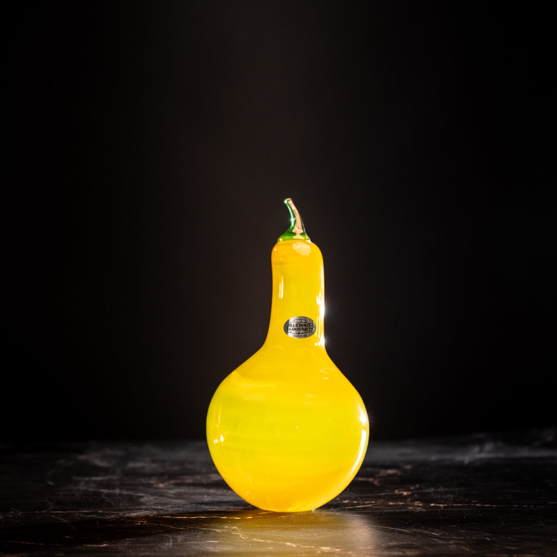 Yellow gourd on a dark background