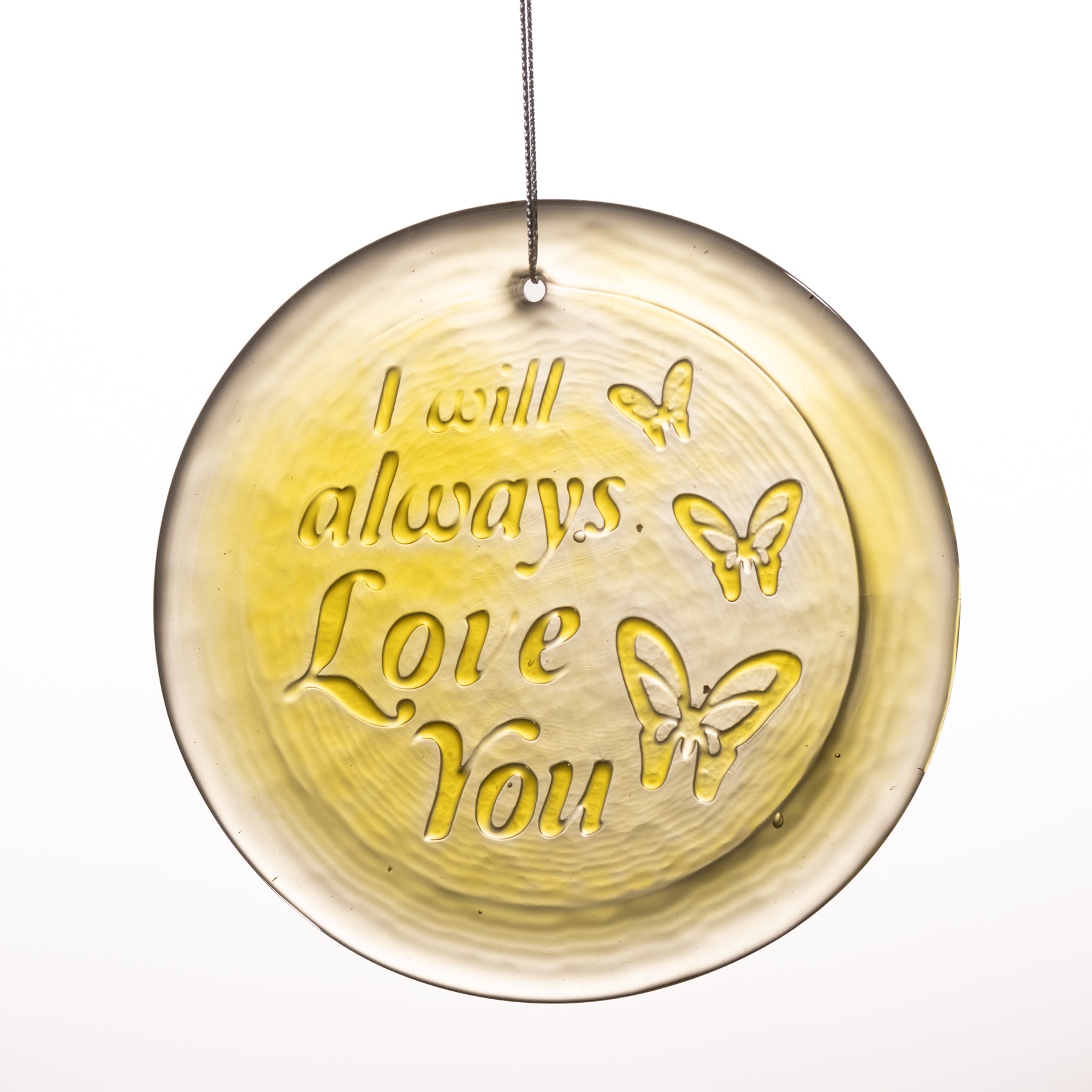 A circular glass suncatcher ornament with a hanging string, featuring the embossed text 'I will always Love You' and butterfly designs on a white background.