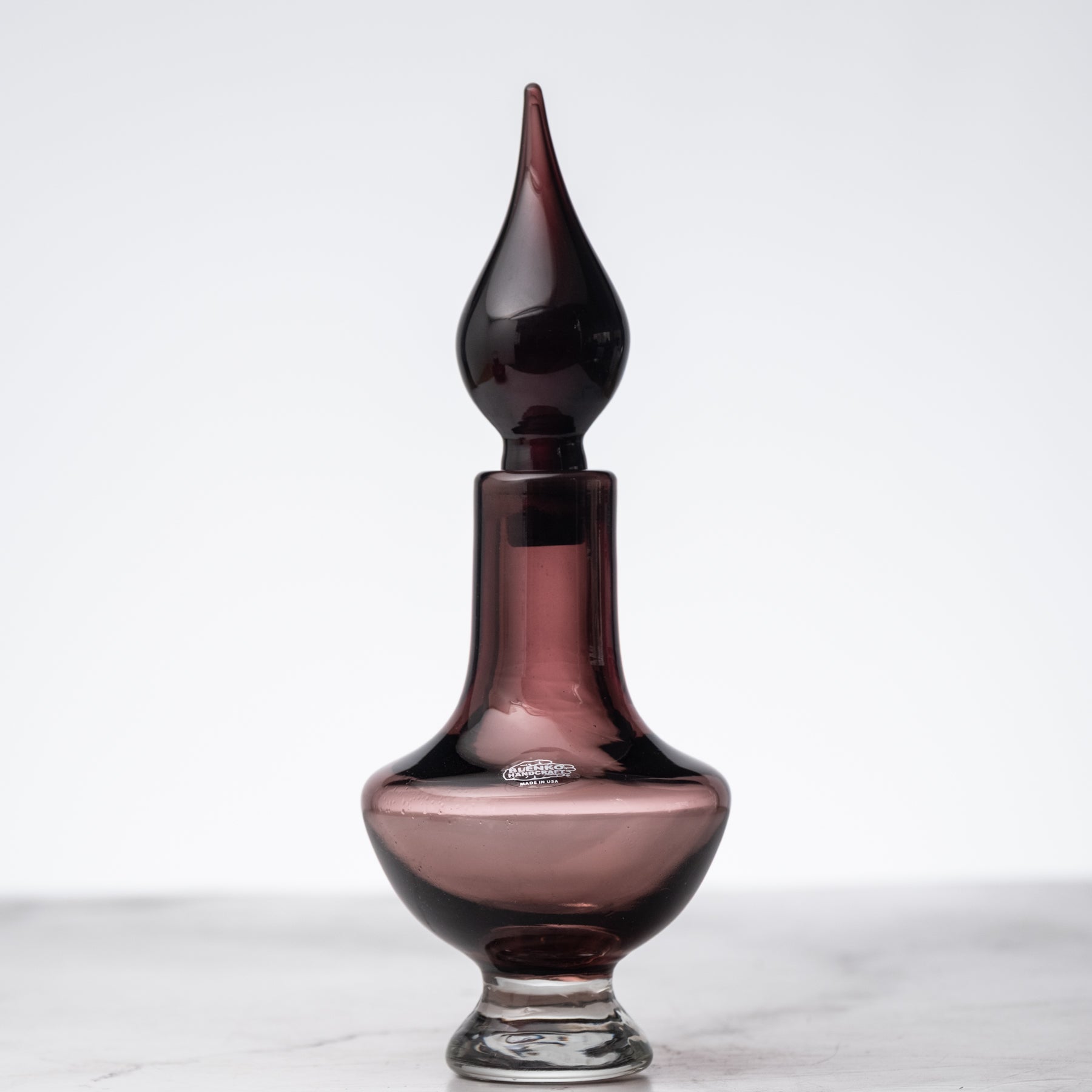 Amethyst decanter on white background