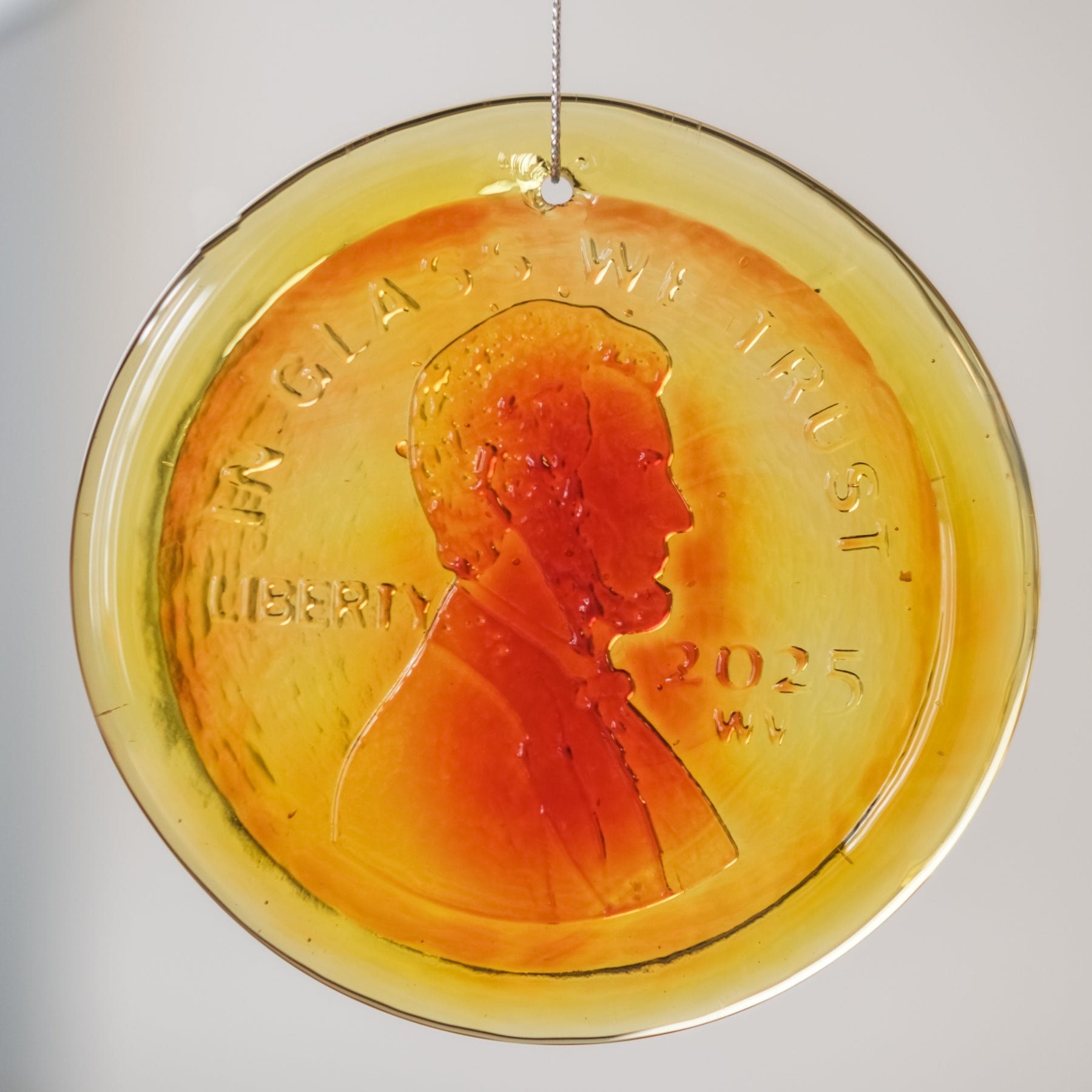 4" Blenko "Heads" Penny Suncatcher - Tangerine