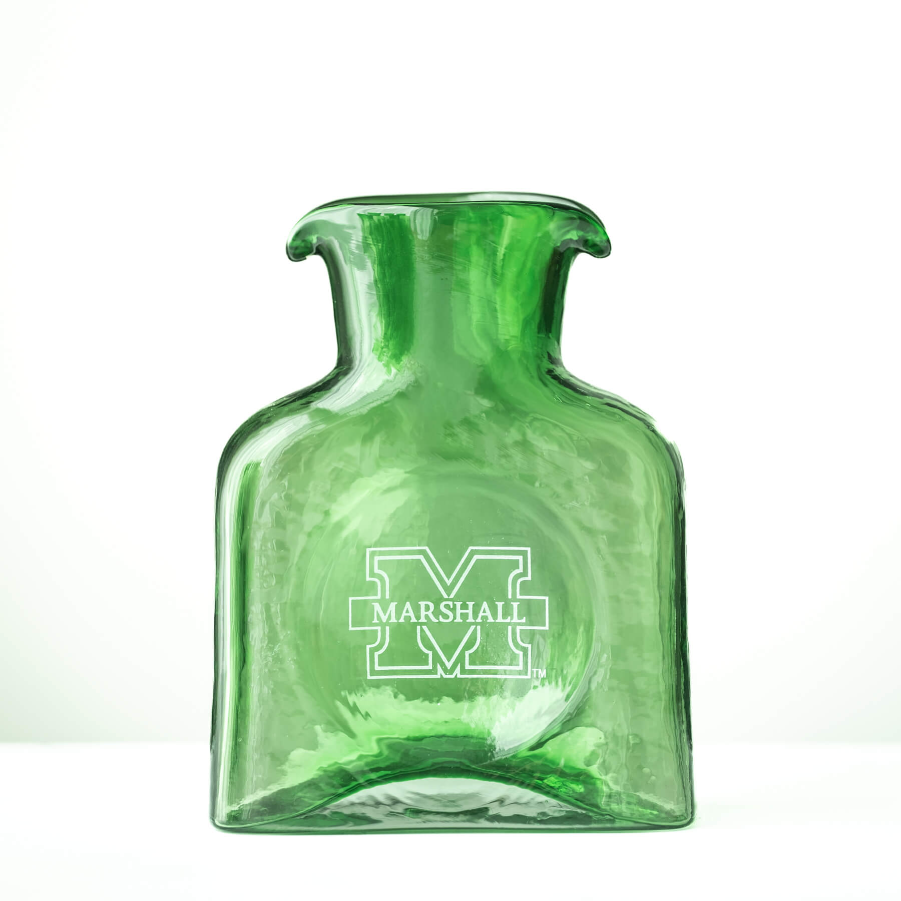 A green glass bottle vase featuring the white Marshall logo and text on the front, set against a plain white background.